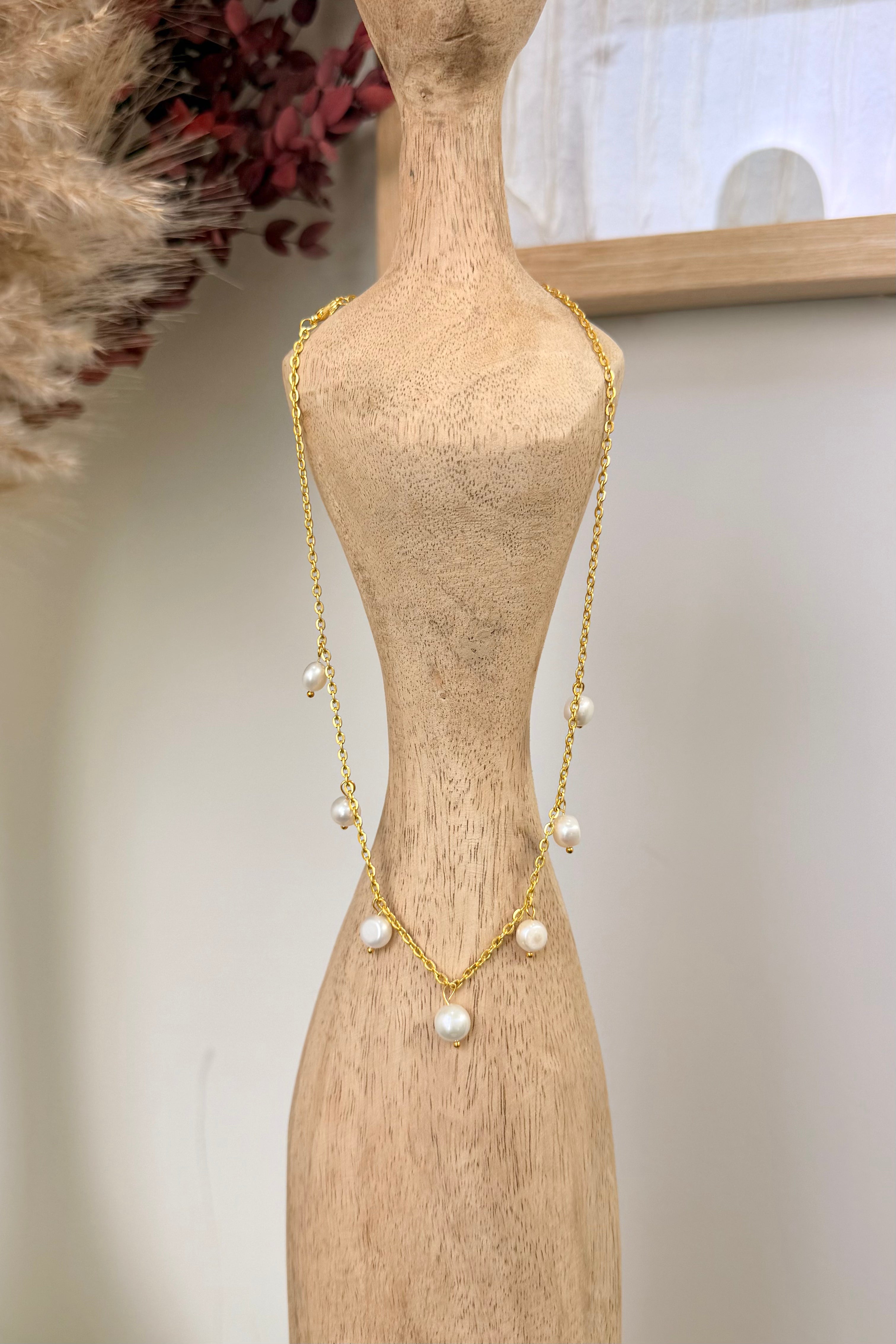 pearl drop necklace with gold hardware