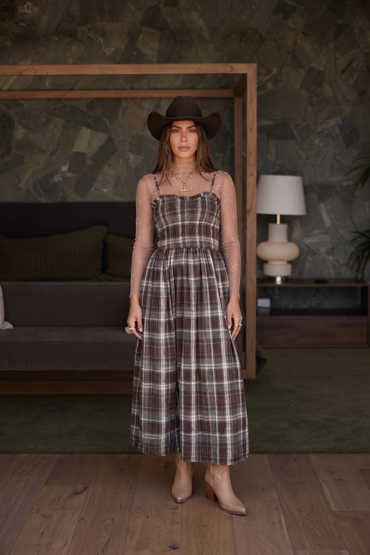 Women’s brown plaid maxi dress with smocked bodice, spaghetti straps, ruffled neckline and flowy tiered skirt