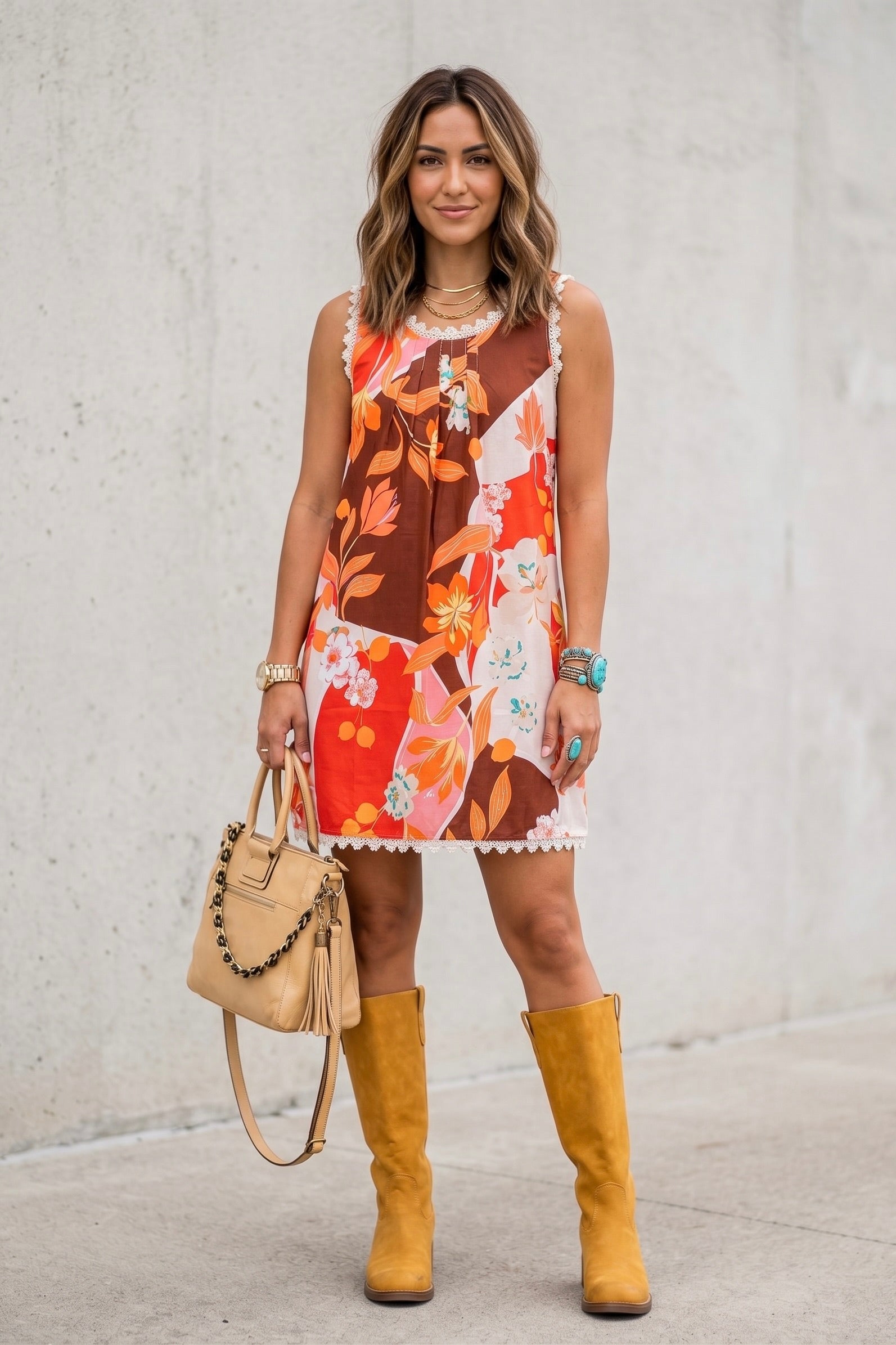 Sleeveless boho floral mini dress featuring a vintage-inspired brown and cream floral print with lace trim along the neckline and hem.