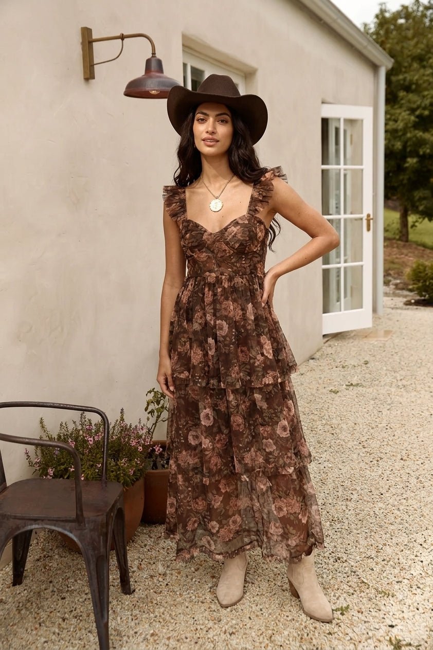 Brown vintage-inspired floral chiffon maxi dress with ruffle straps, sweetheart neckline, fitted bodice, and tiered flowy skirt.