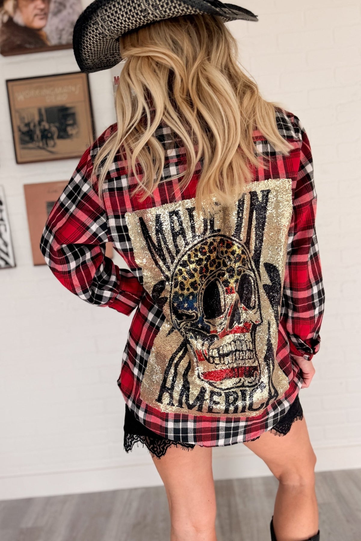 Women’s red, black and cream plaid flannel button-down shirt featuring a relaxed oversized fit, collared neckline, long sleeves, button front closure and dual chest flap pockets. Classic tartan plaid shirt styled as an easy layering piece for casual, grunge-inspired and fall outfits.