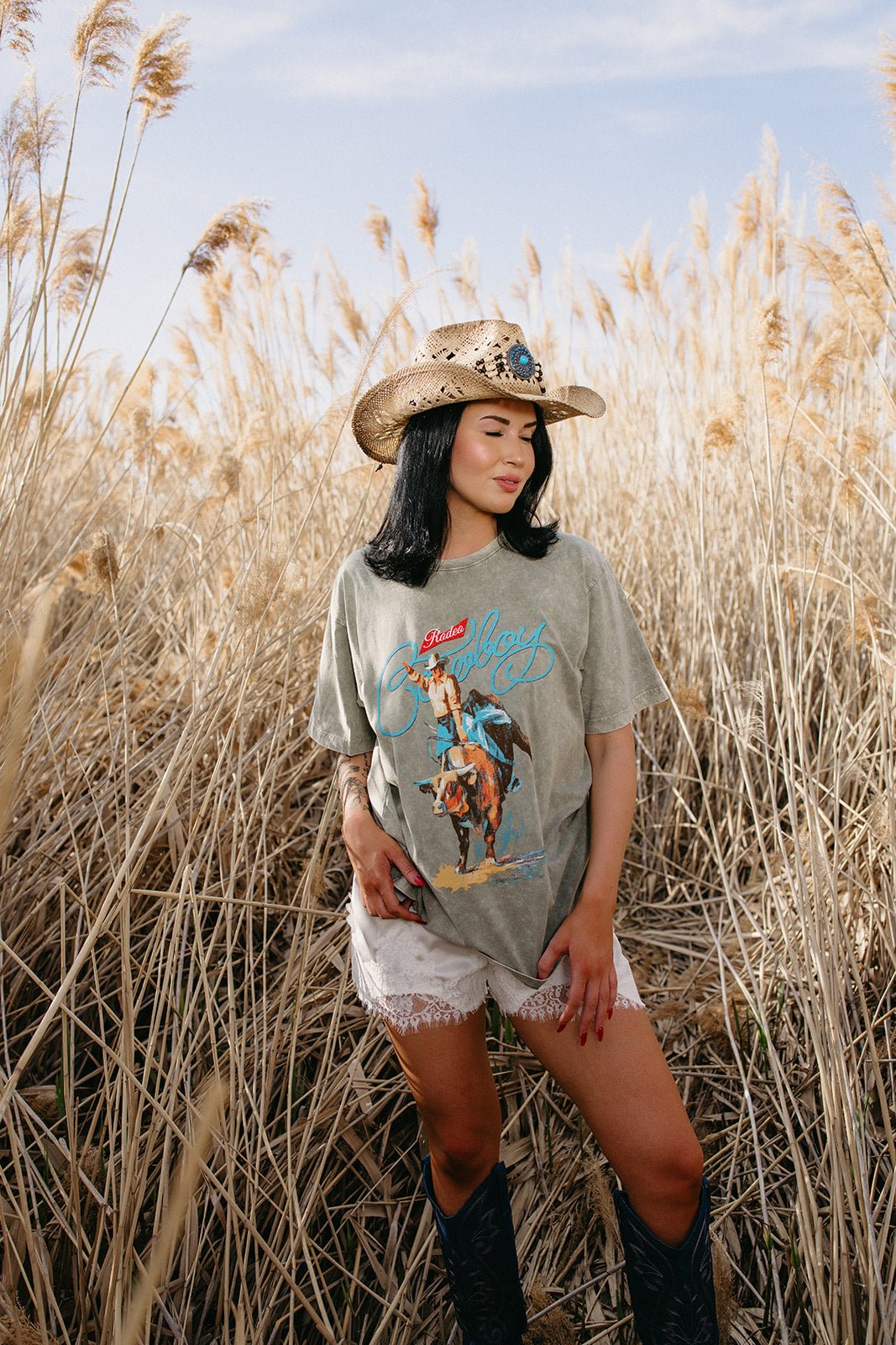 Western graphic tee, vintage rodeo shirt, oversized cowboy t-shirt, faded graphic tee, country concert outfit, boho western style, women's country festival outfit, Rodeo outfits, Sand and Charcoal.