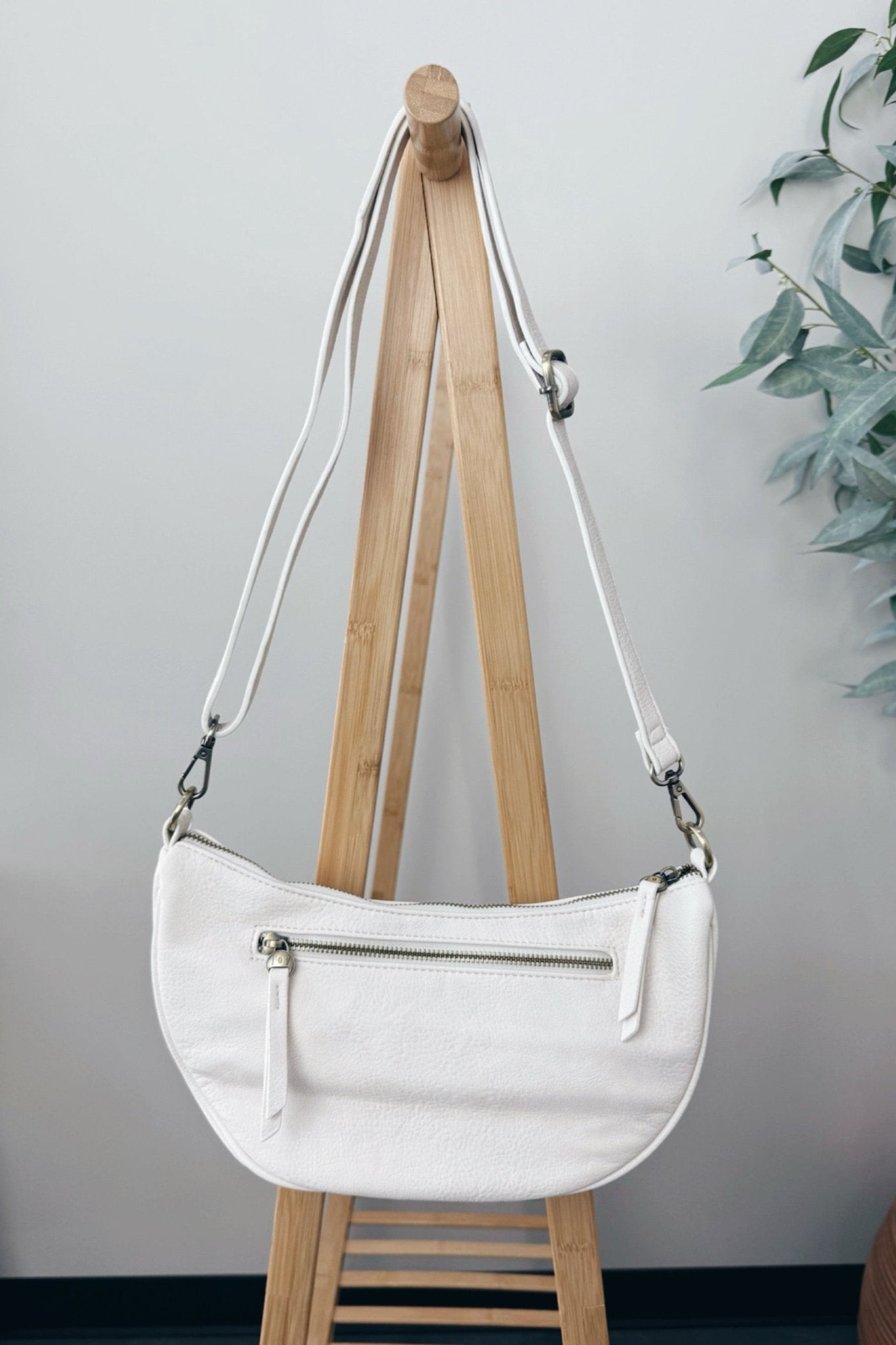 crescent silhouette vegan leather bag