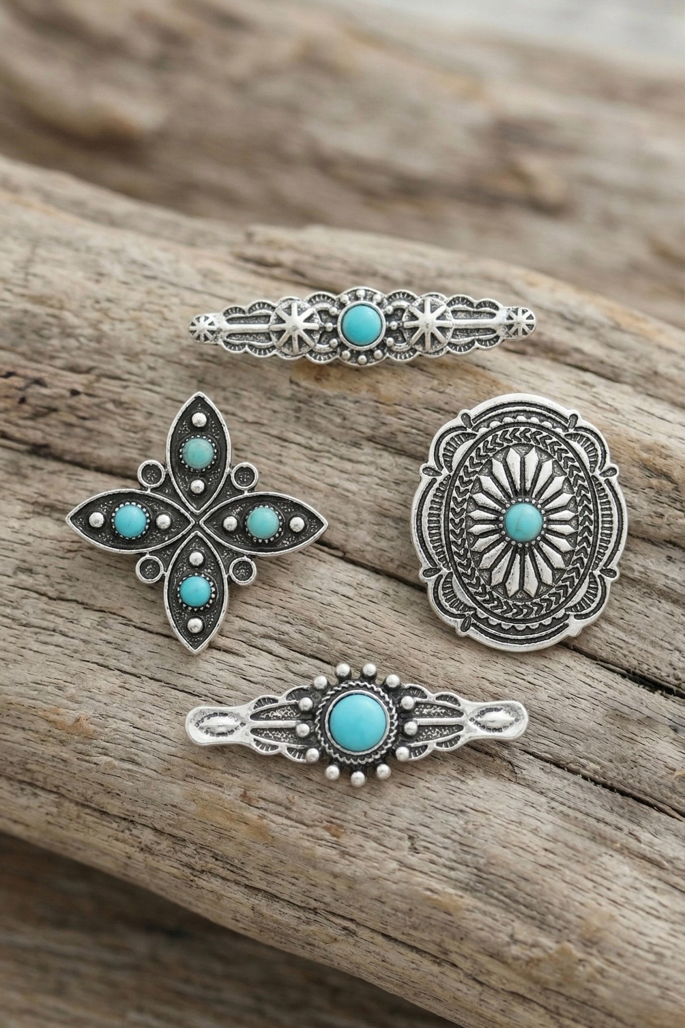 Western turquoise concho pins with silver vintage detailing for country concert outfits, gothic cowgirl fashion, rodeo accessories, western festival looks, boho cowgirl style, and edgy western boutique fashion from Sand + Charcoal Boutique.