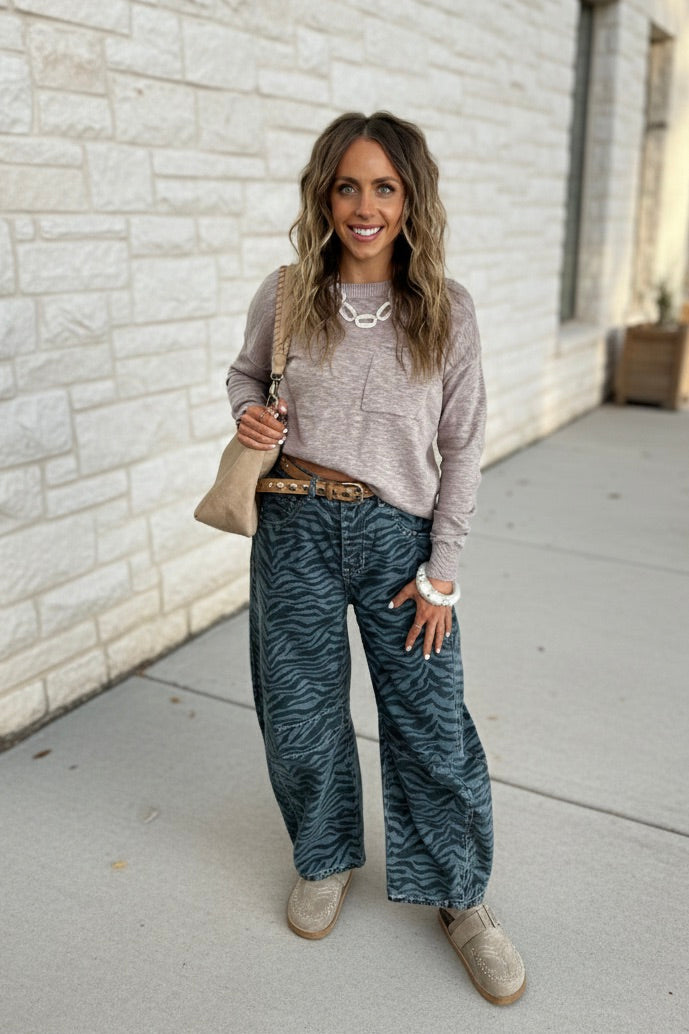 Long sleeve sweater with a relaxed fit, shown in two color options