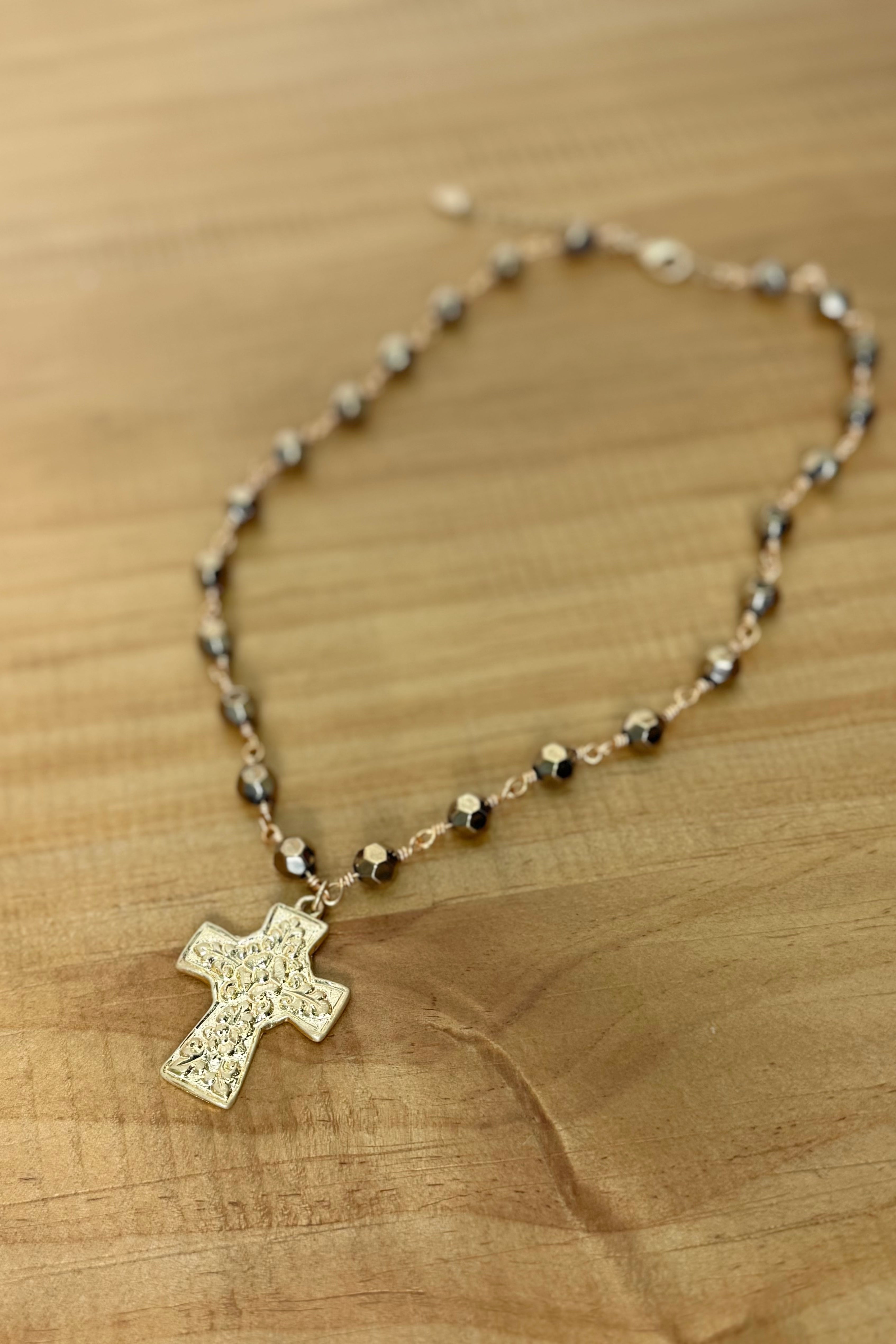 chunky gold cross pendant with beads
