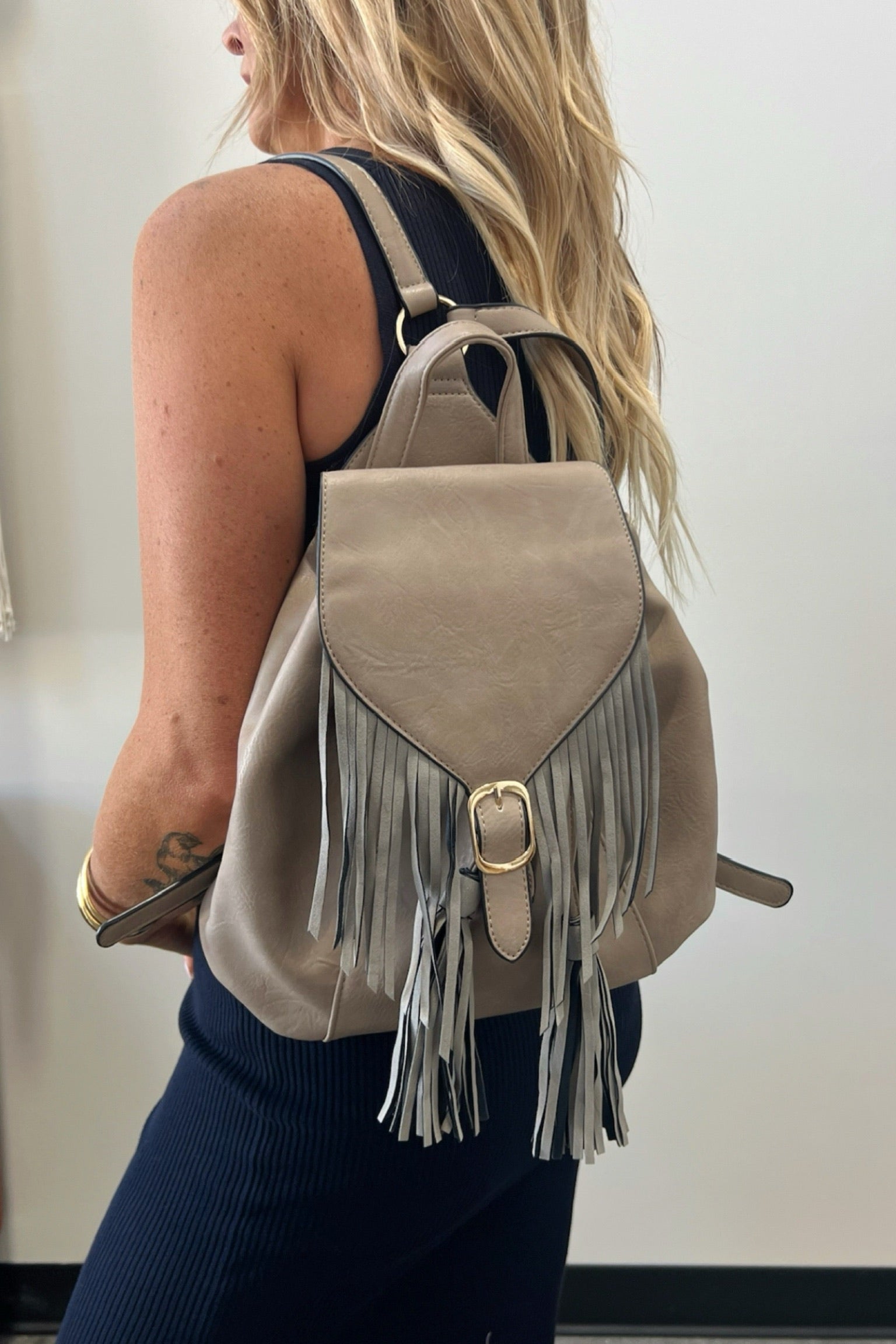 Tethered Wind Fringe Backpack