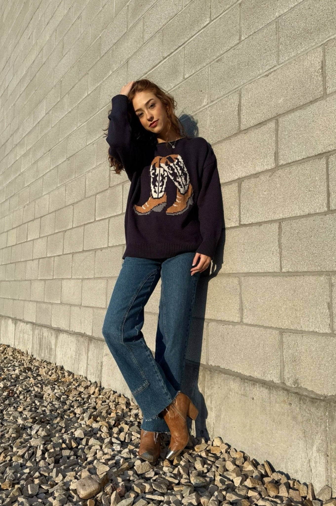 long sleeve sweater with cowboy boot graphic