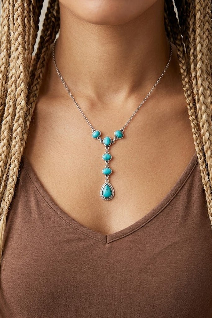 Western turquoise drop necklace with antique silver details, boho cowgirl statement jewelry, layered turquoise necklace for country concert outfits and boutique western styling
