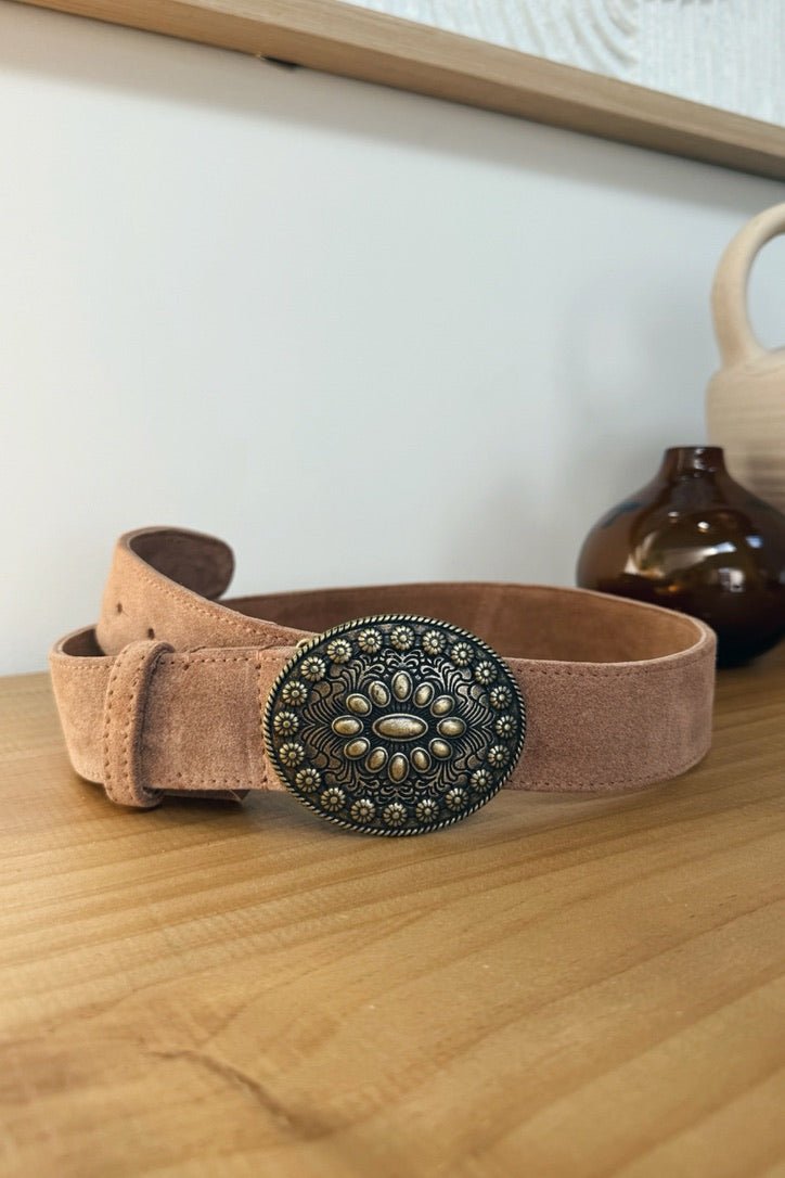 leather belt with metal design buckle