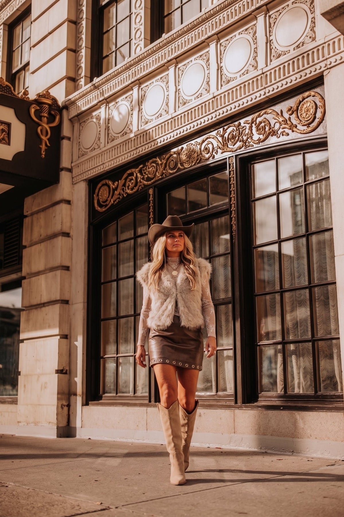 Extended sleeve faux fur vest. Perfect for NFR or anytime you need to dazzle