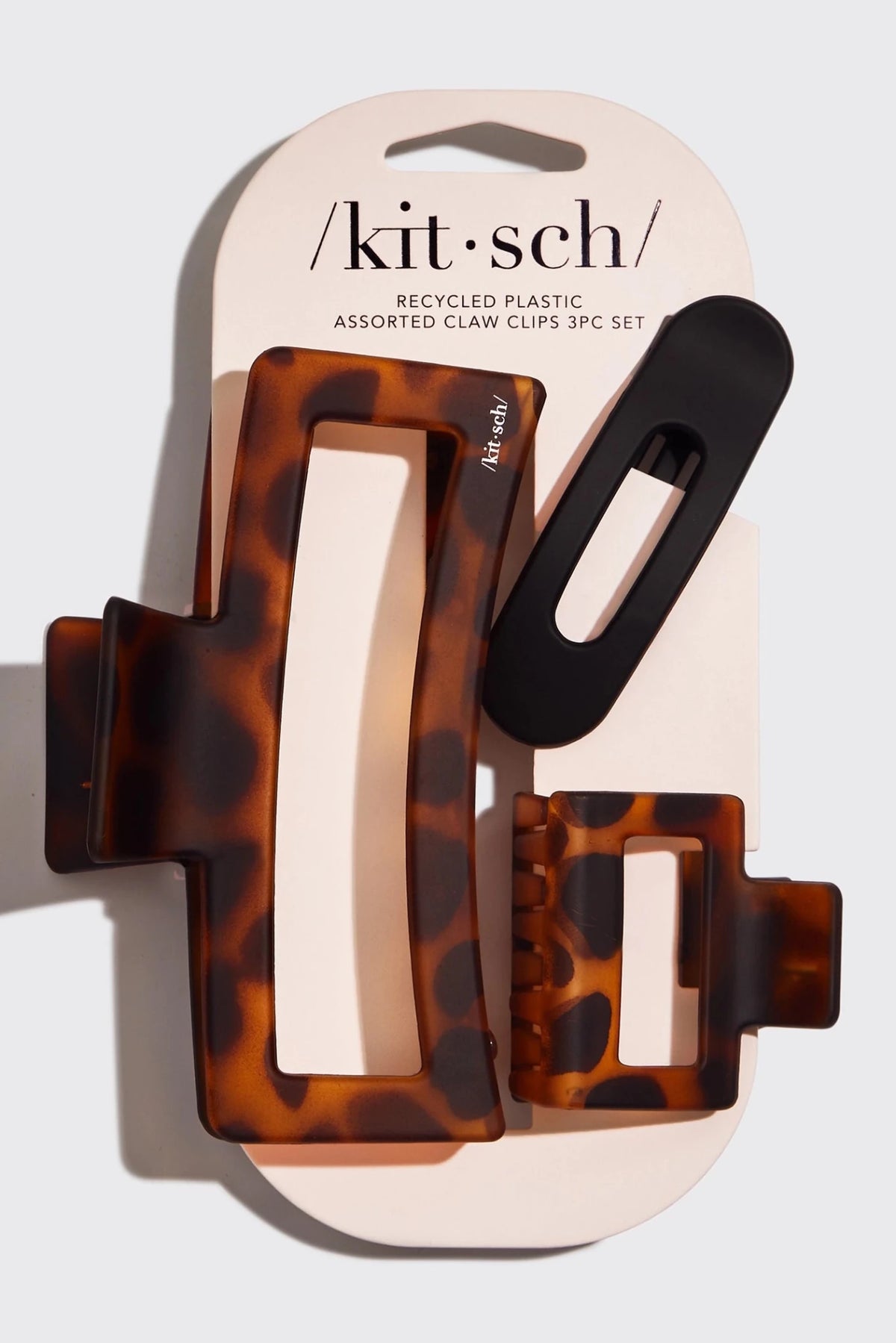 Kitsch Assorted 3 pack of claw clips.  With one flat clip