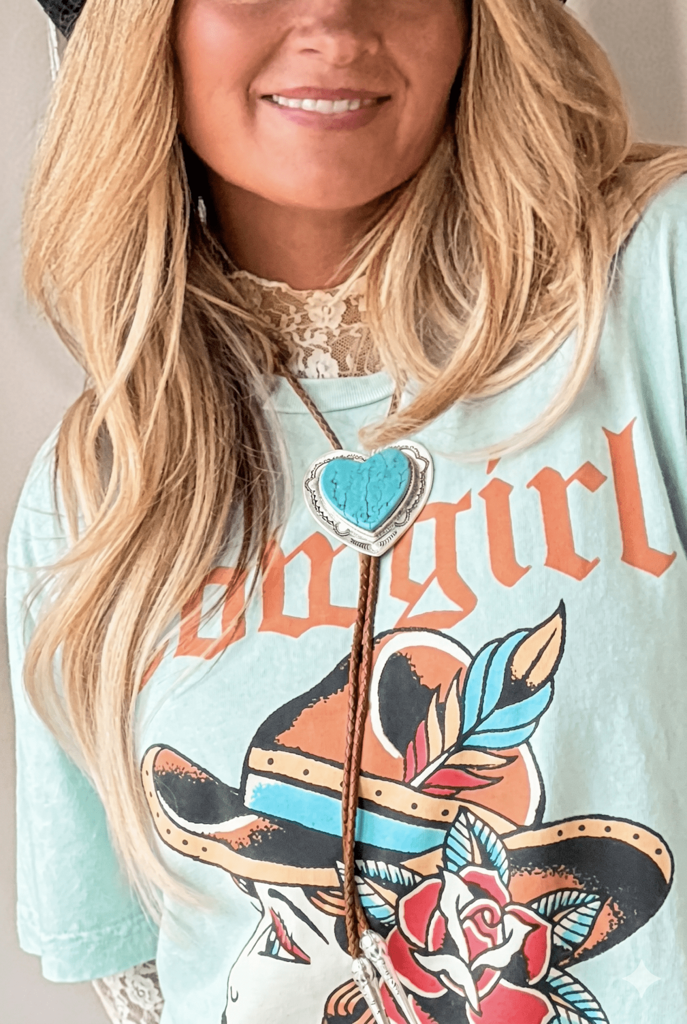 Turquoise bolo tie, heart pendant, silver and turquoise. Perfect for accessorizing country concert, rodeo, and festival fits.
