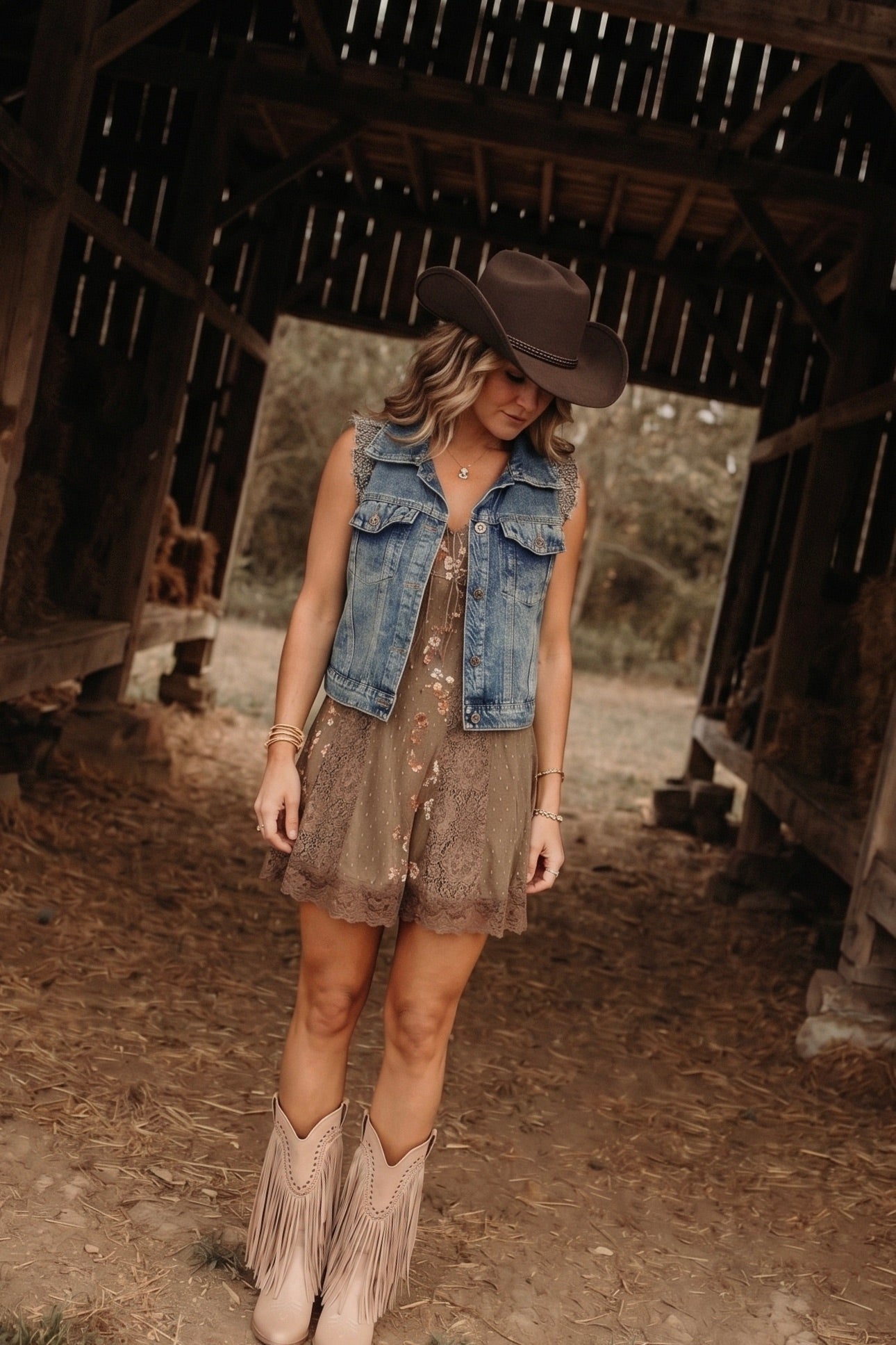 Denim vest with embroidered detailing on the sleeves. Perfect to add just a touch of something extra to any outfit. Perfect for country concerts, fairs, festivals, and more.