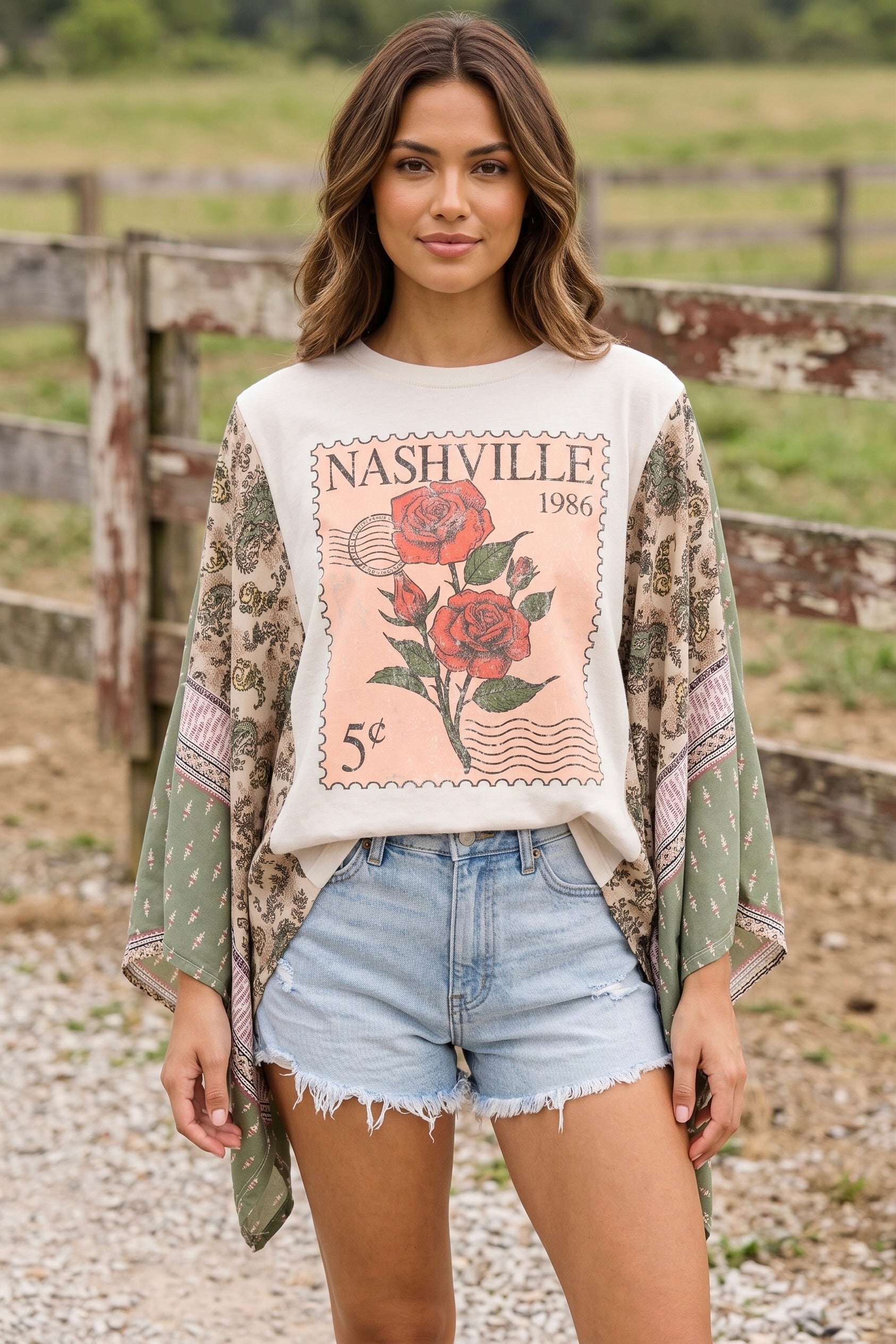 Cream Nashville vintage graphic kaftan top featuring a postage stamp rose graphic with flowy green damask contrast sleeves and a relaxed oversized fit.