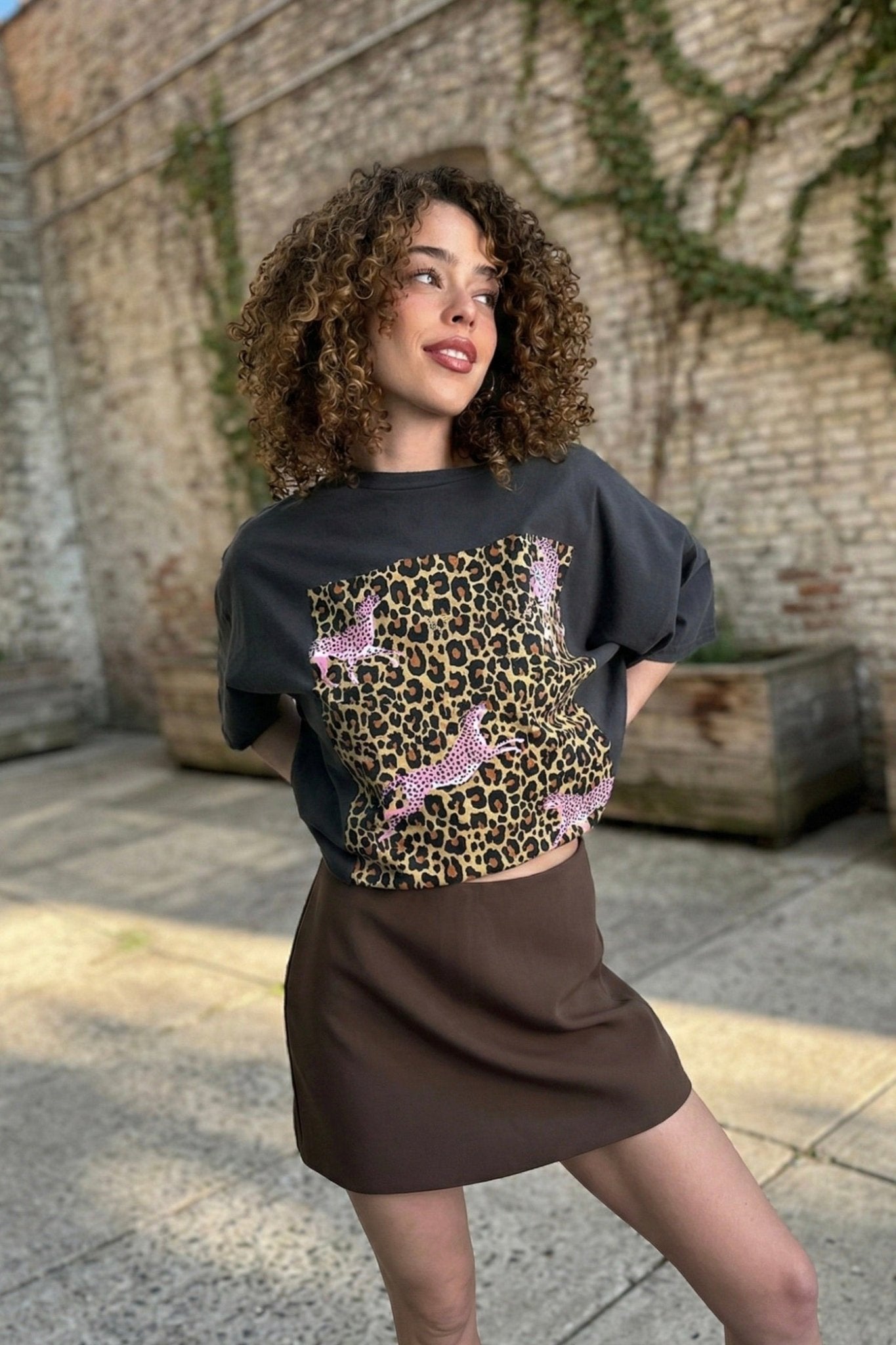 Pink cheetah tee, oversized graphic t-shirt, leopard print shirt, vintage wash cotton top, boxy fit streetwear, pink instinct tee, distressed graphic tee, women's edgy basics.