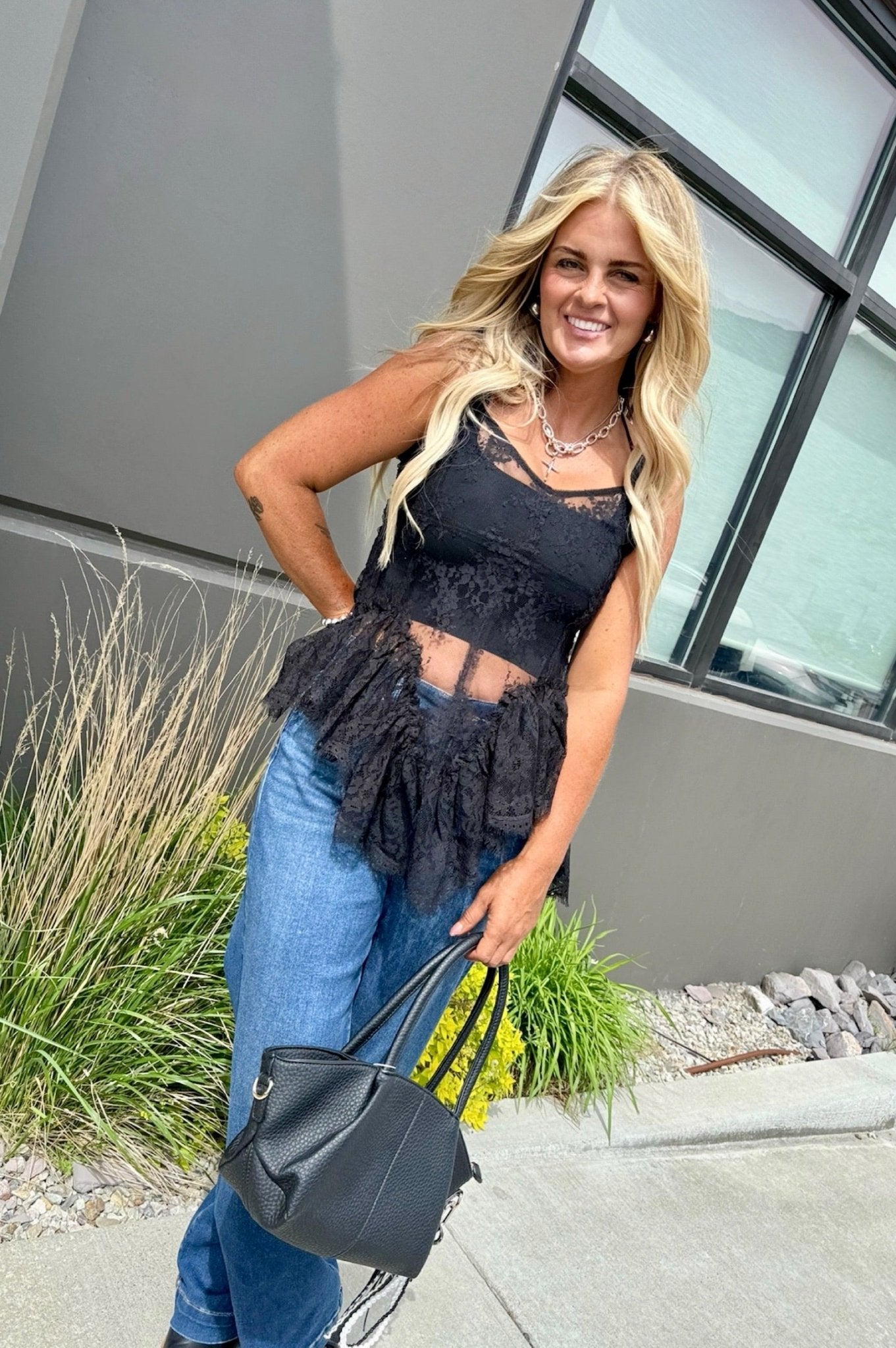 Sheer lace tunic, ruffled lace top, black lace layering piece, festival outfit essentials, western lace style, edgy feminine fashion, boho concert wear, cami lace tunic.