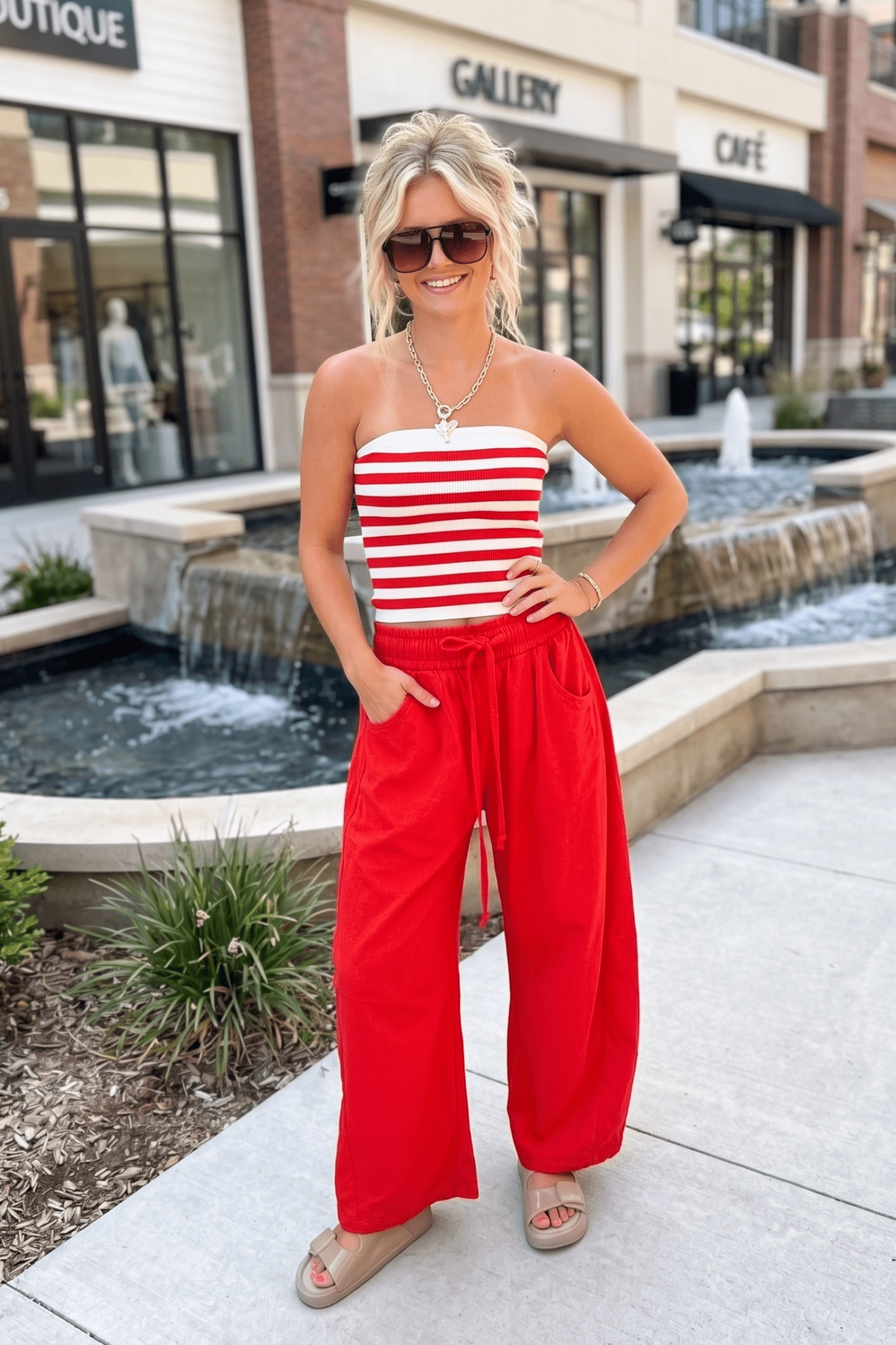 Red and white striped tube top for Americana-inspired outfits, perfect for Fourth of July celebrations, summer concerts, patriotic events, vacation styling, and classic all-American fashion.